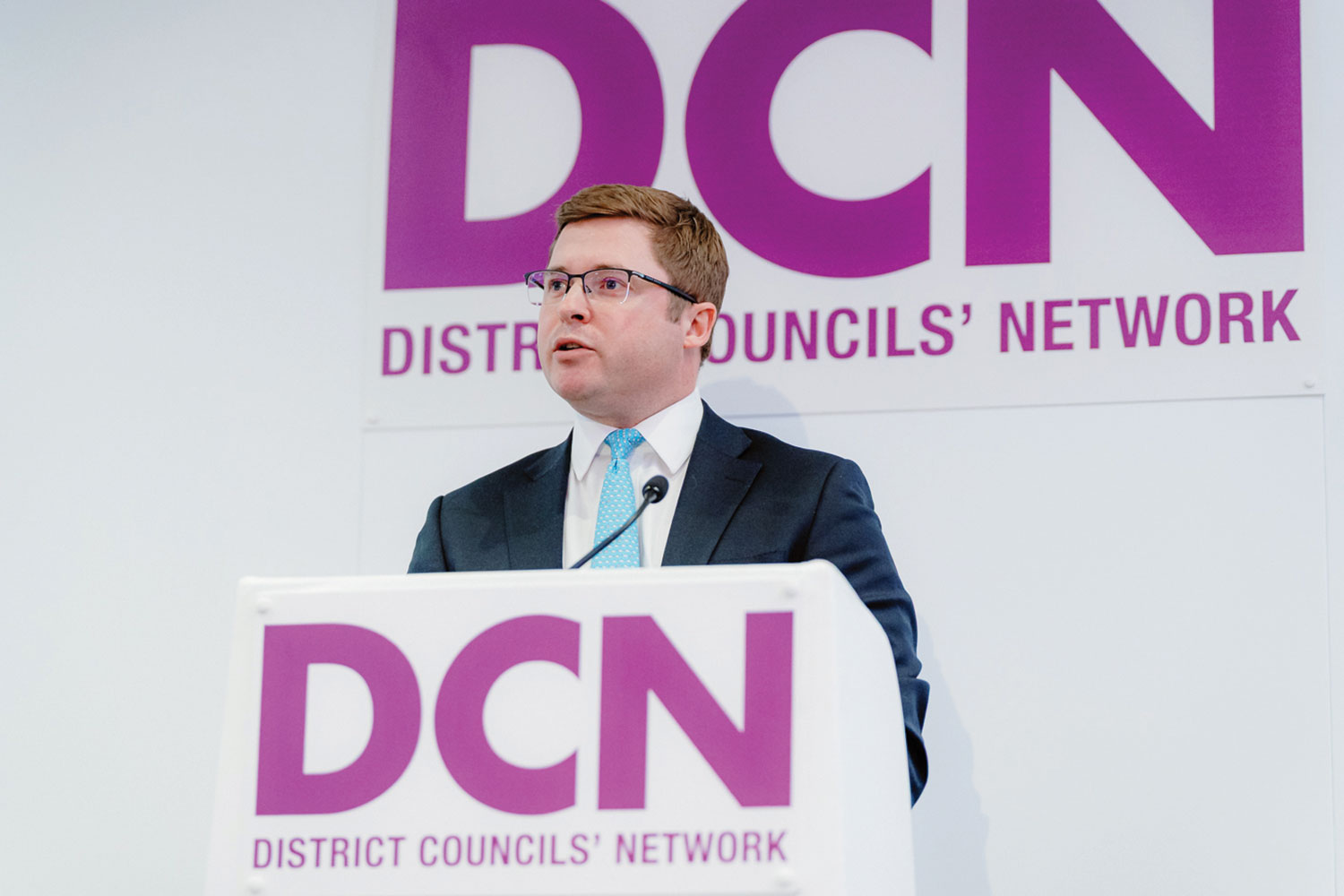 Cllr Sam Chapman-Allen, Chair of the District Councils’ Network, speaking at DCN’s annual conference in April,